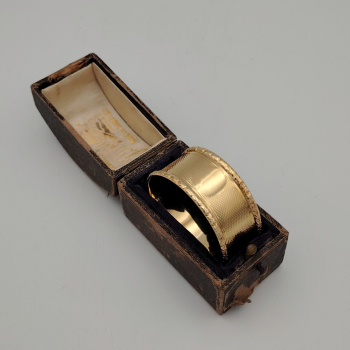 Solid gold napkin ring